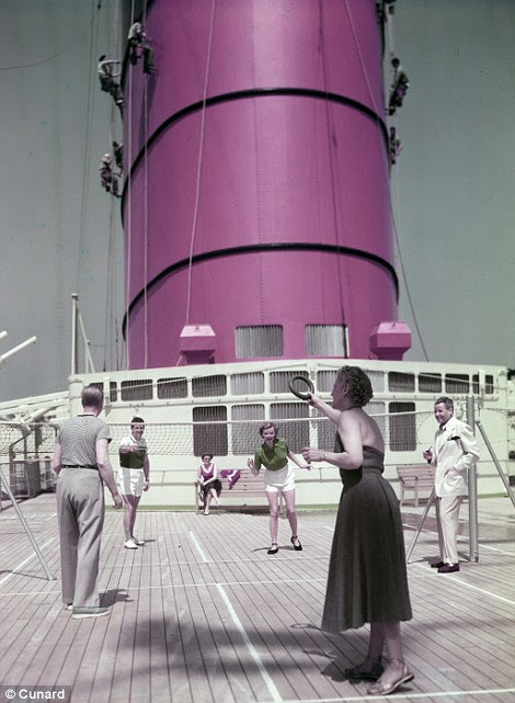 A group of passengers enjoy a game of hoops in the sun on the ship's deck