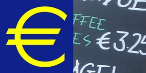 English: The Euro symbol (€) printed and in ha...
