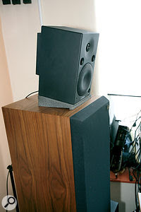 There's no particular reason not to tilt your speakers to make sure the tweeters are aimed towards your ears, but bear in mind that some speakers are designed to beam sound either up or down from the horizontal axis, so experiment with the sound, rather that just looking at where the tweeter is pointed! A good option for safe tilting is Auralex's Mo-Pads, as seen here. There's no particular reason not to tilt your speakers to make sure the tweeters are aimed towards your ears, but bear in mind that some speakers are designed to beam sound either up or down from the horizontal axis, so experiment with the sound, rather that just looking at where the tweeter is pointed! A good option for safe tilting is Auralex's Mo-Pads, as seen here.