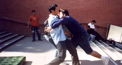 Tommy, Chris and Mike rehearsing a tackle that will take place during the fight scene.