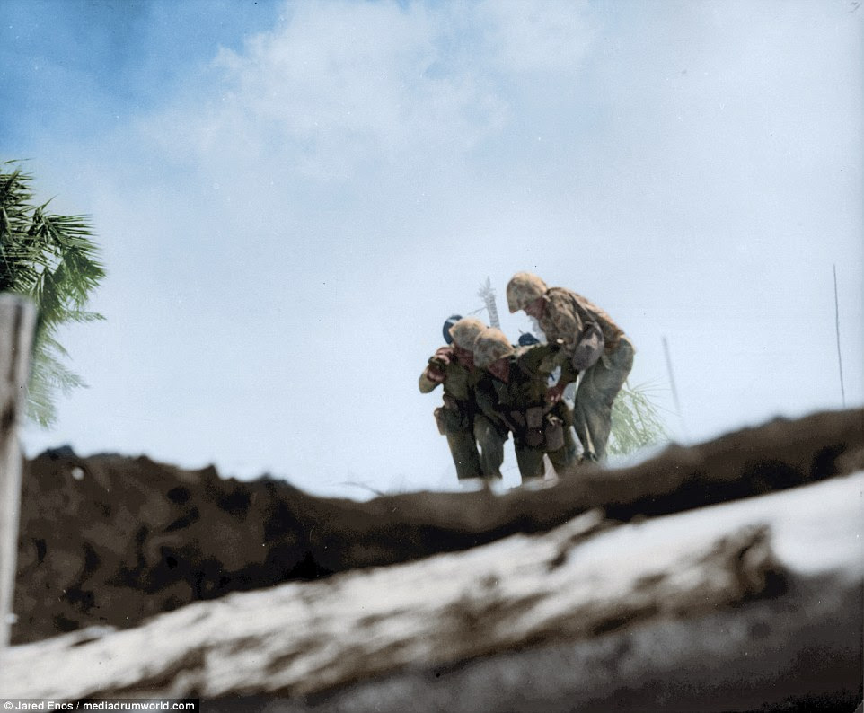 A wounded marine was carried to safety in Tarawa in November 1943, almost two years before the beginning of the war