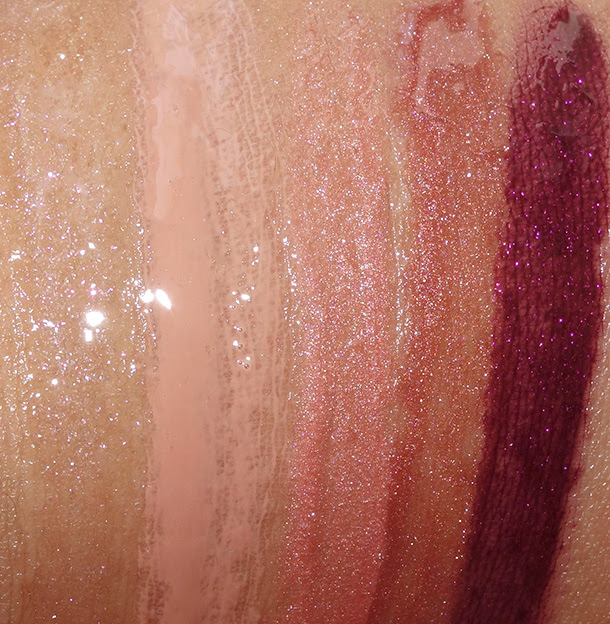 MAC Alluring Aquatic Lipglass swatches from the left: Clear Water, Peachstock, Water Deities, Seducing Sound and Modern Lure