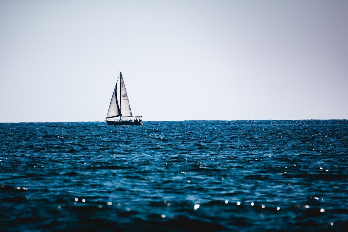 Free Sail Boat on the Beach Stock Photo