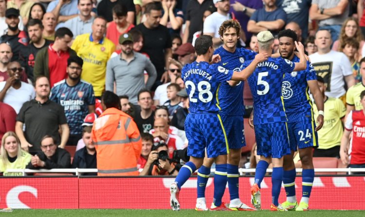 Chelsea players celebrate their second goal