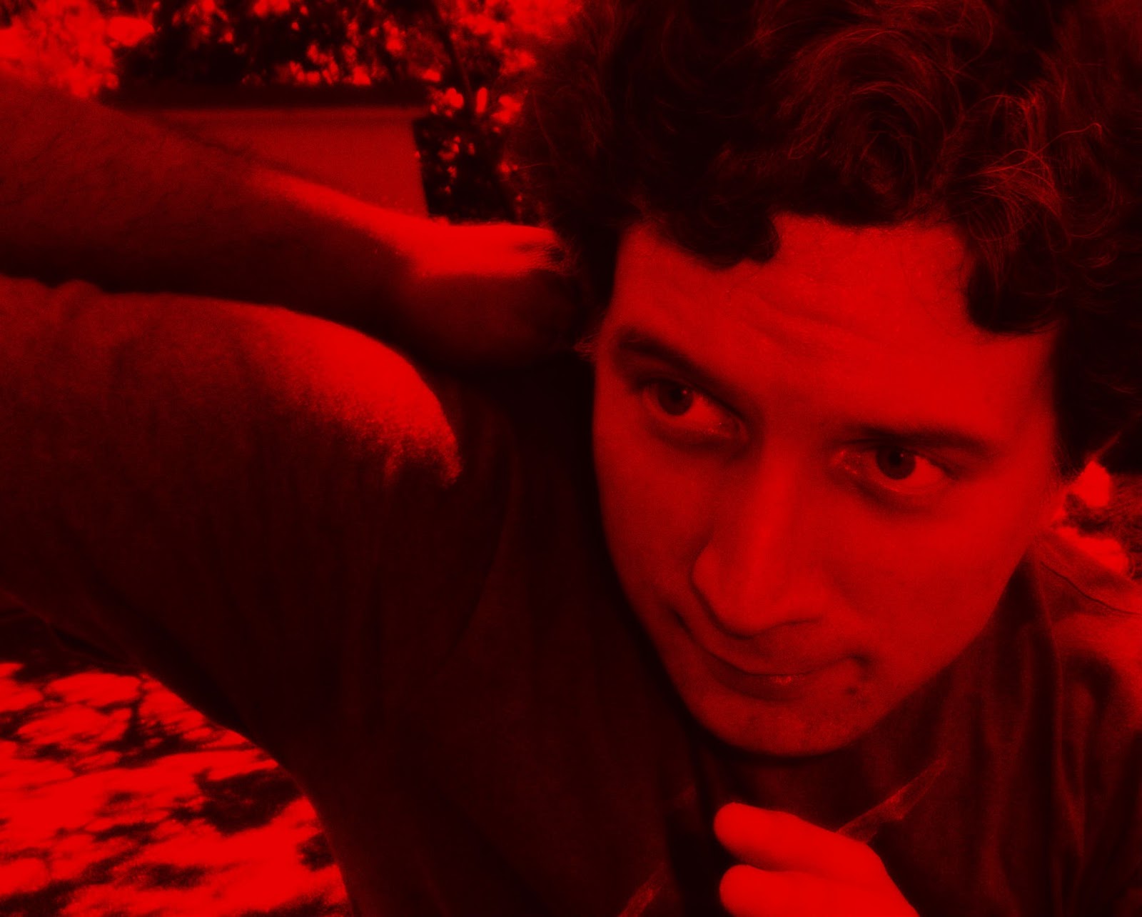 Andrew's Bio Background noise glamour sepia red.jpg