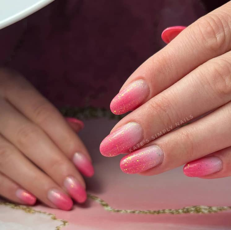 Full picture showing the gold dust on pink nails 
