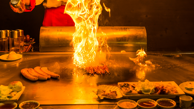 Hibachi grill with fire in center