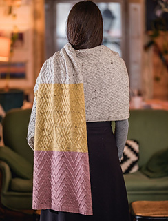 woman modeling an oversized colorblock scarf