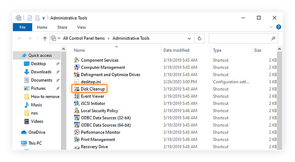 Opening the Disk Cleanup tool from the Administrative Tools in Windows 10 Safe Mode.