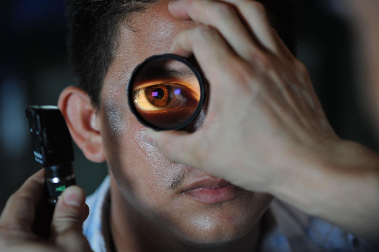 Las Vegas ophthalmologist examining male patient for signs of glaucoma 