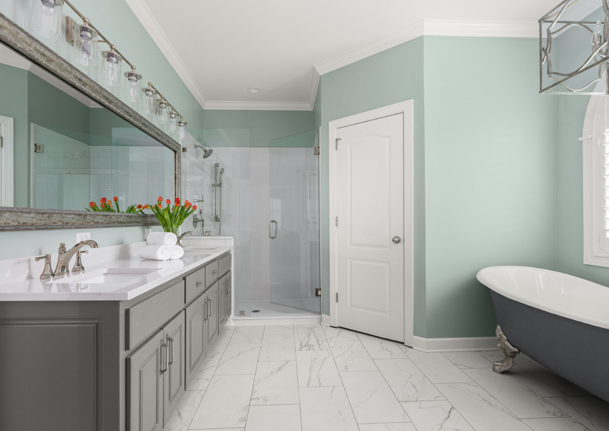 superior-construction-and-design-mt-juliet-tn-color-in-the-home-sea-foam-green-walls-bathroom-grey-vanity-claw-foot-tub