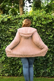 lady with back to camera showing knitted hoodie