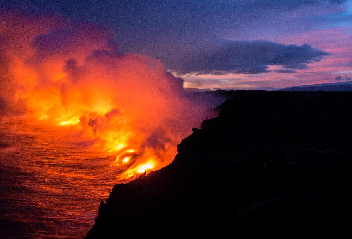 Volcano lava into the sea, | Free Photo - rawpixel