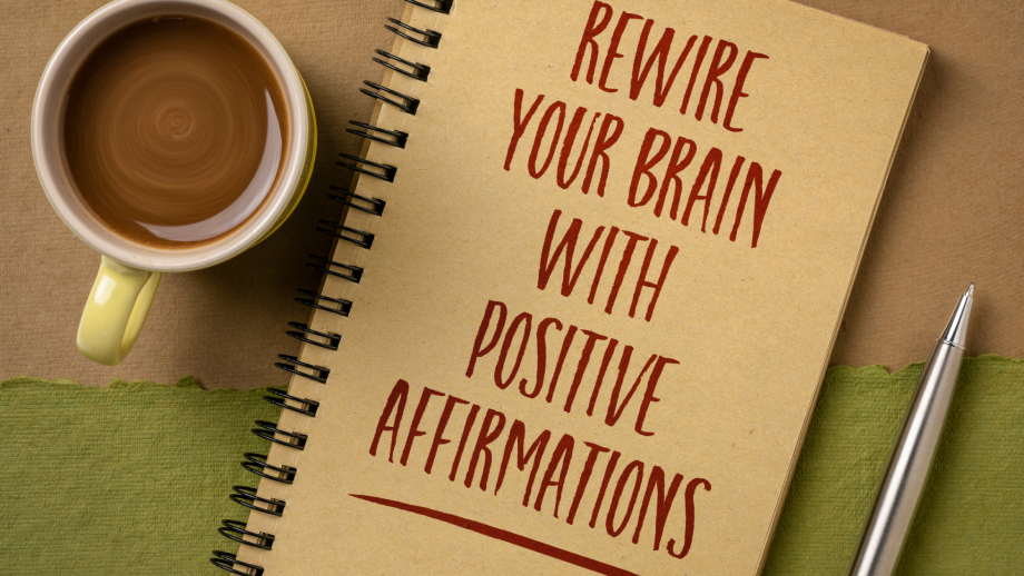 Rewire your brain with positive affirmations. written on a notebook