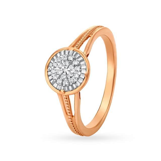 A gold and silver ring with diamonds

Description automatically generated