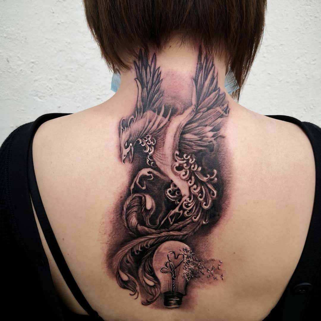 Phoenix With A Bulb Tattoo