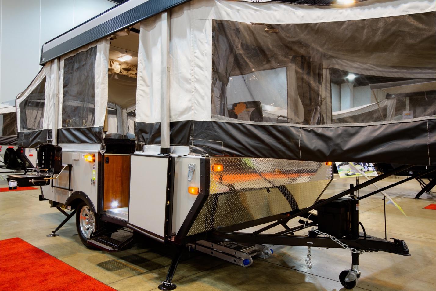 High-wall pop-up camper in an RV display roomd