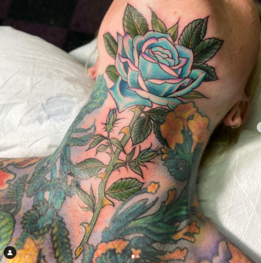 Rose Tattoo On Full Neck