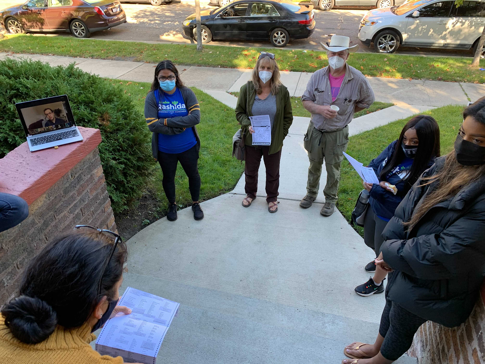 Photo: Me with canvassers this weekend going over sample ballots, maps of satellite voting centers, and more. Photo credit: Katie Byerly, field organizer with Rashida for Congress. 