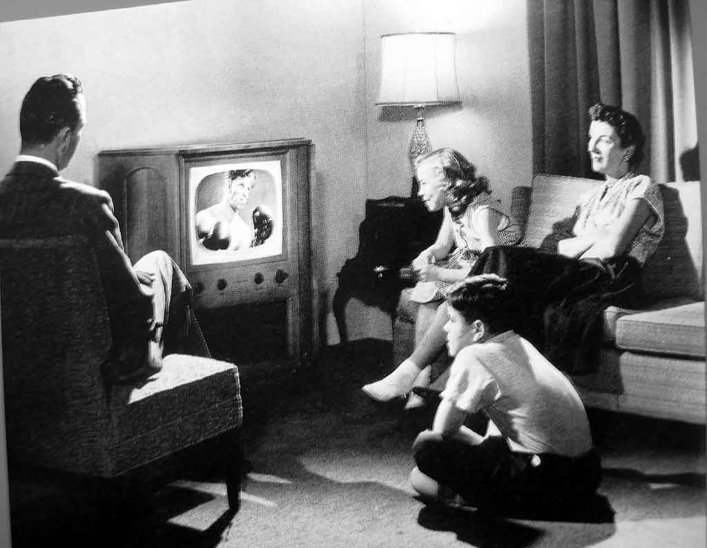 American family slouching watching tv in the 1950s