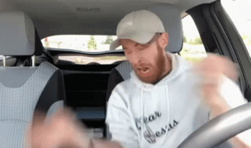 Man in a car screaming