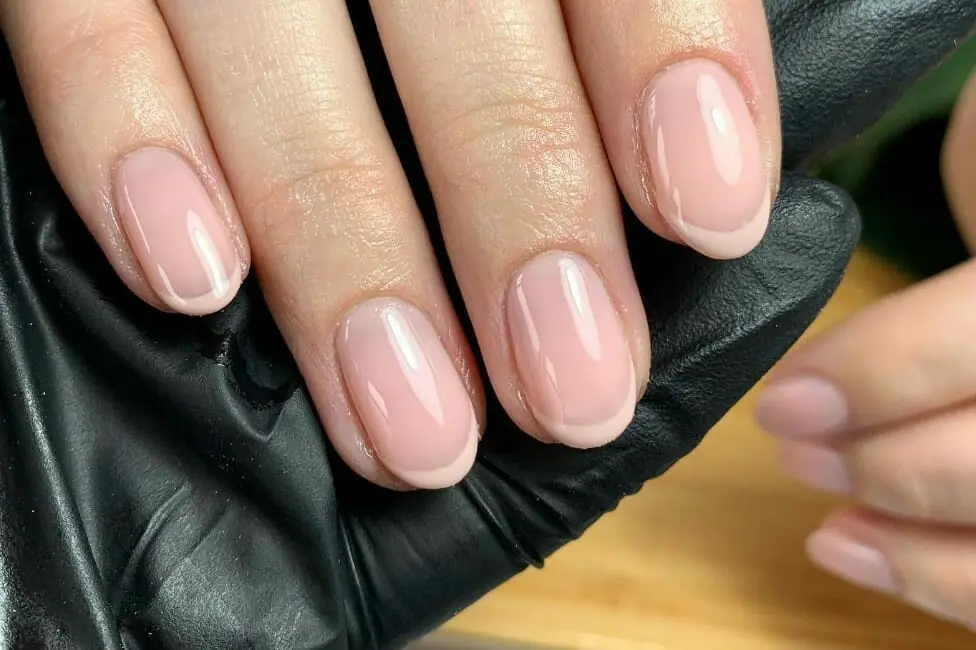 Close up look of the nude nails with nude tips 