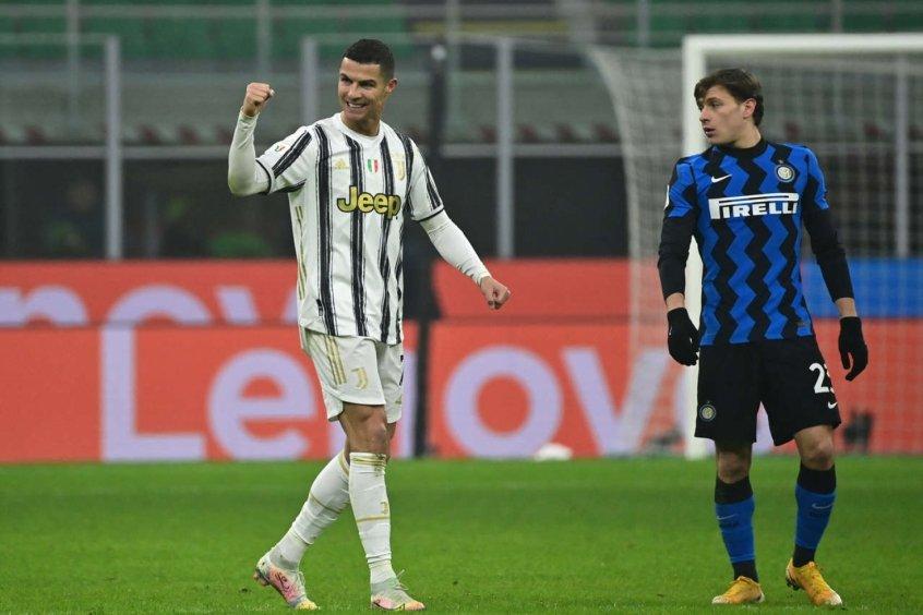 Cristiano Ronaldo vibra após marcar 2 gols contra o Inter de Milão na Copa da Itália    (Foto: Miguel Medina - AFP)