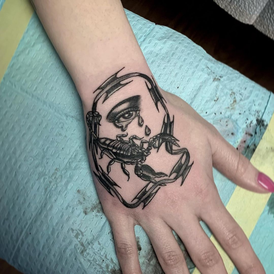 Eye With Scorpion Tattoo