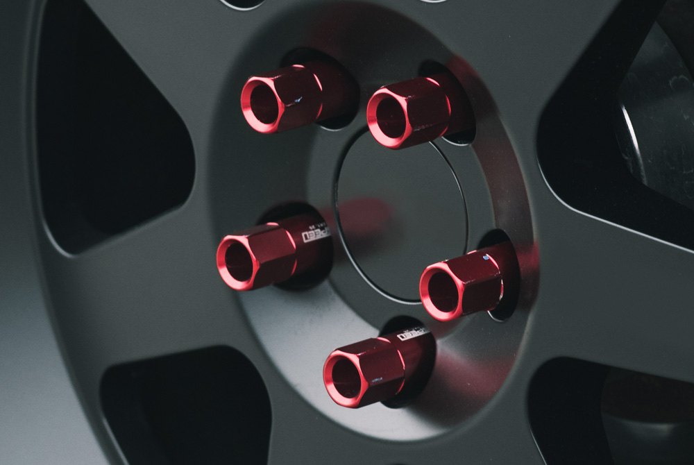 Examples Of Red Lug Nuts On Black Wheels