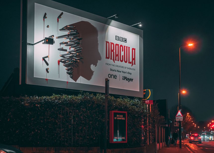 BBC Dracula billboard ad campaign with stakes and shadow of Dracula on the billboard.