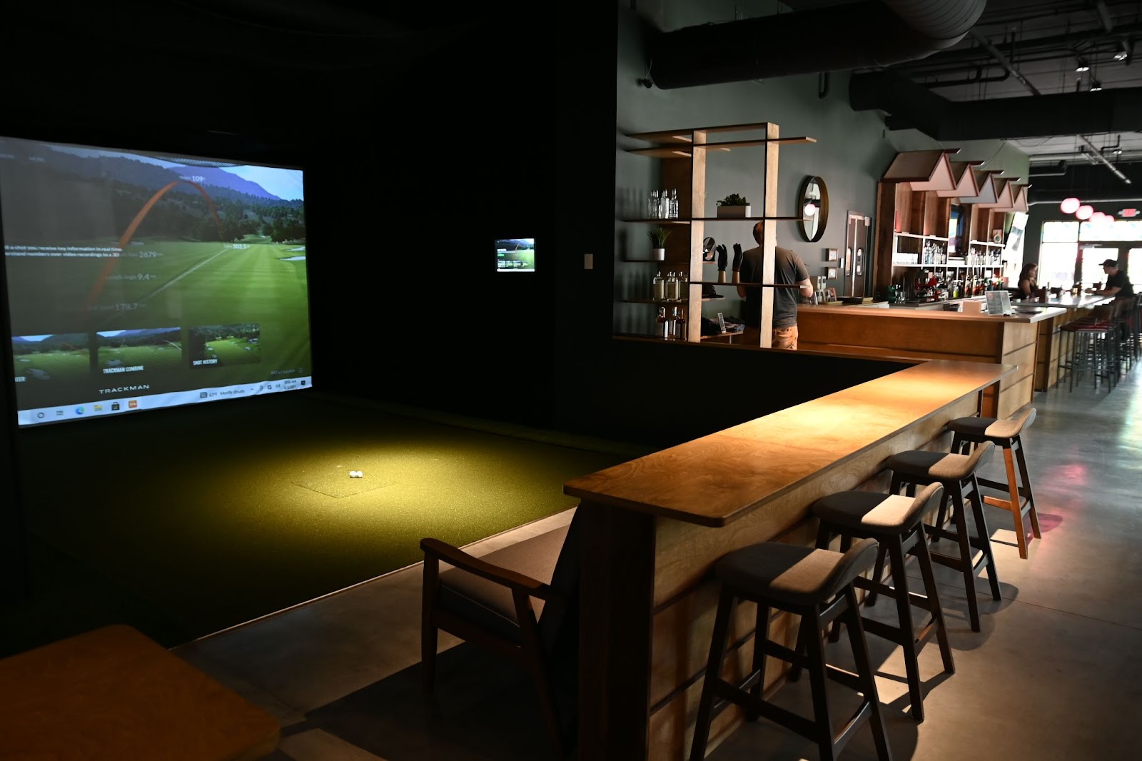 Golf simulator in a restaurant