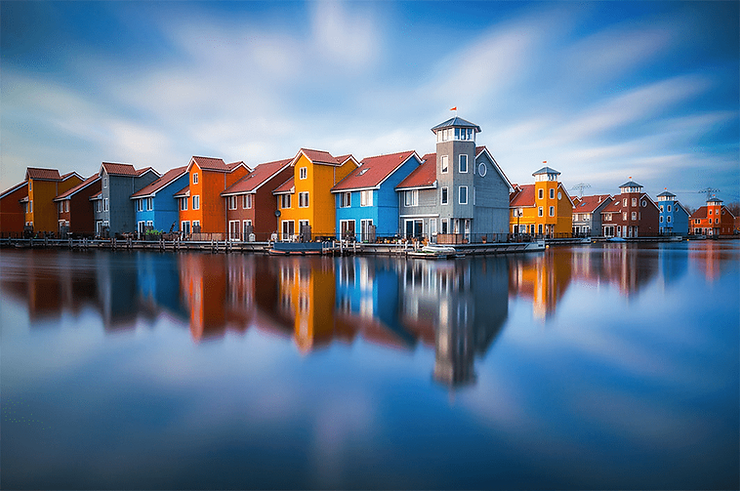 houses reflected on water