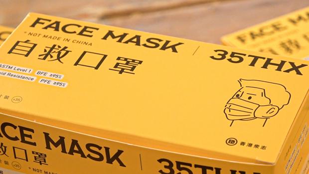 抗疫不忘抗爭,香港眾志推過百萬個「自救口罩」。(張展豪 攝)