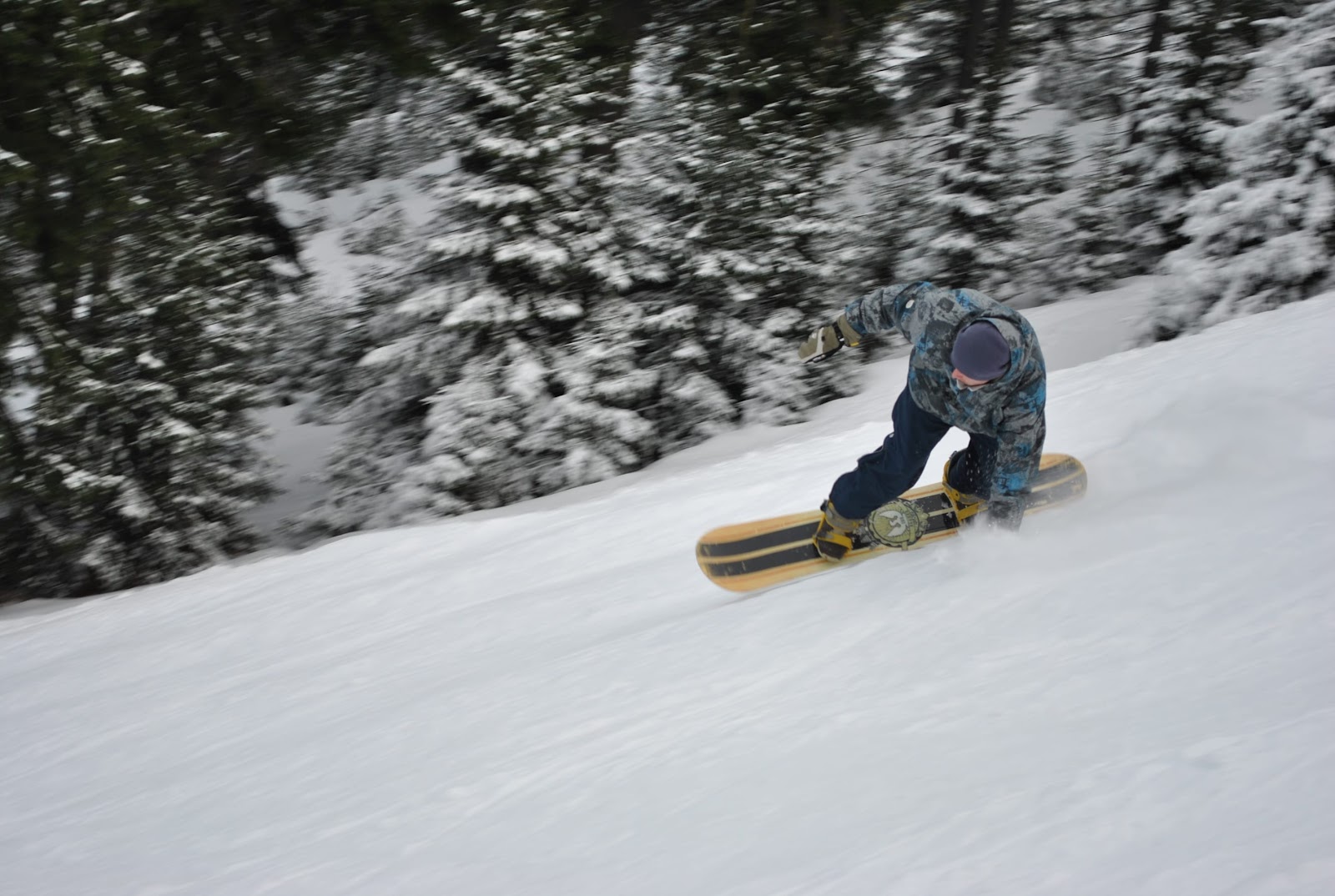 man snowboarding in Flagstaff Arizona