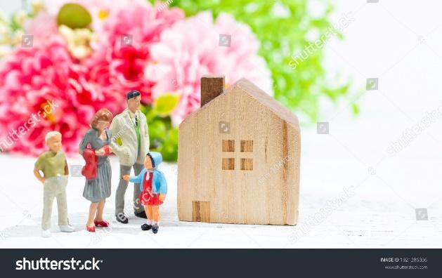  Happy family and a house (Image of happiness and a house)