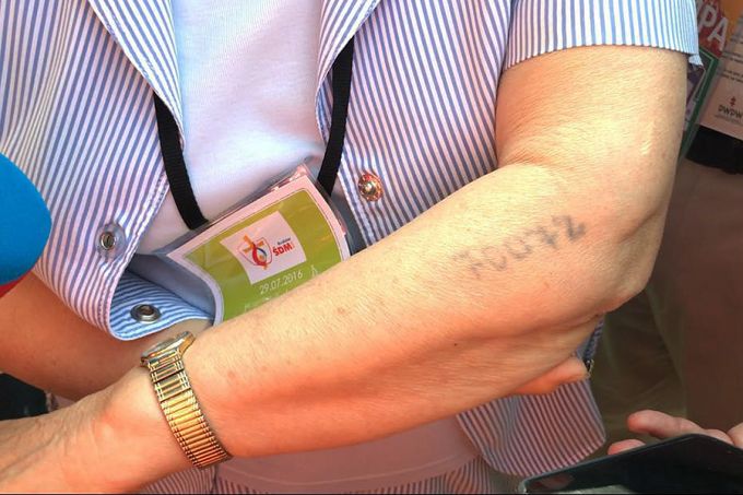 A number tattooed on the forearm of Lidia Maksimovic Bocarova, a survivor of the Auschwitz-Birkenau concentration camp. Credit: Alan Holdren/CNA.