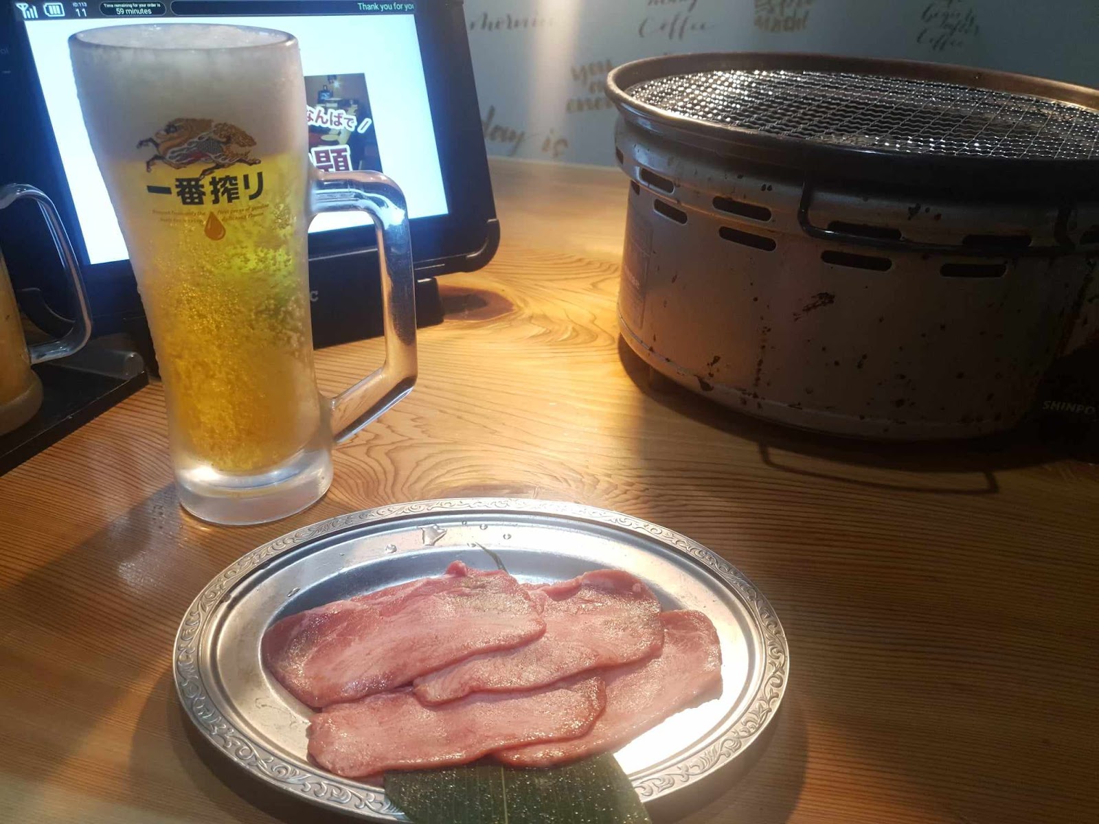 Kirin beer and thin-cut beef tongue at 焼肉力丸上本町店