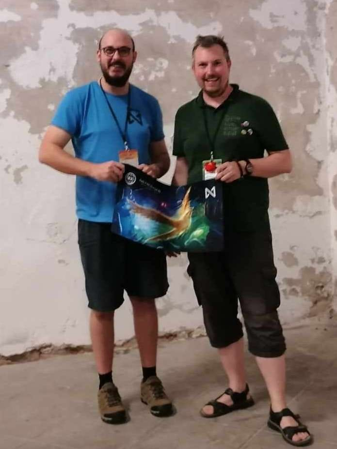 Havvy (right) and Tradon (left) holding Tradon’s one of a kind Saci playmat