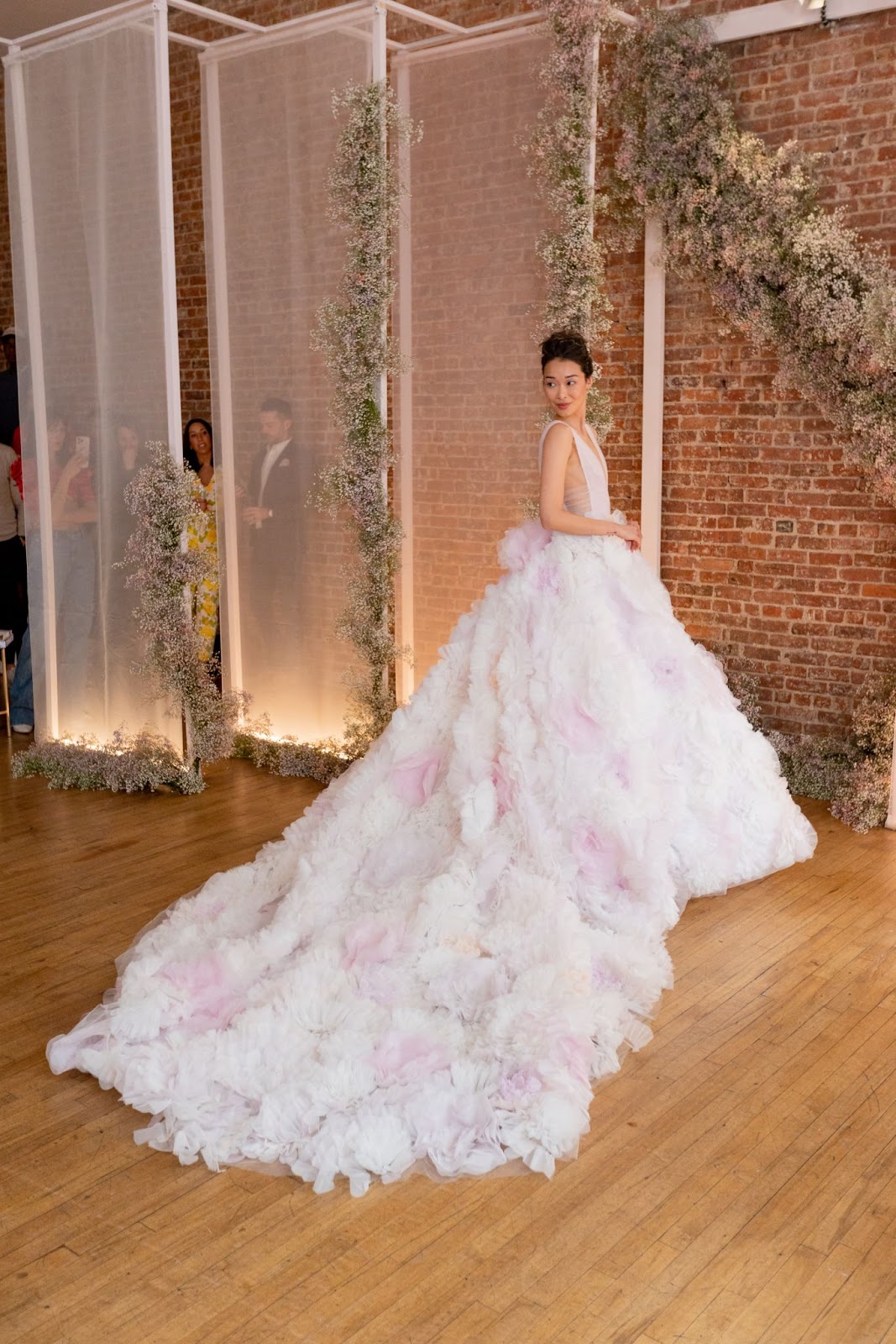 Pops of pastel on this whimsical wedding gown.