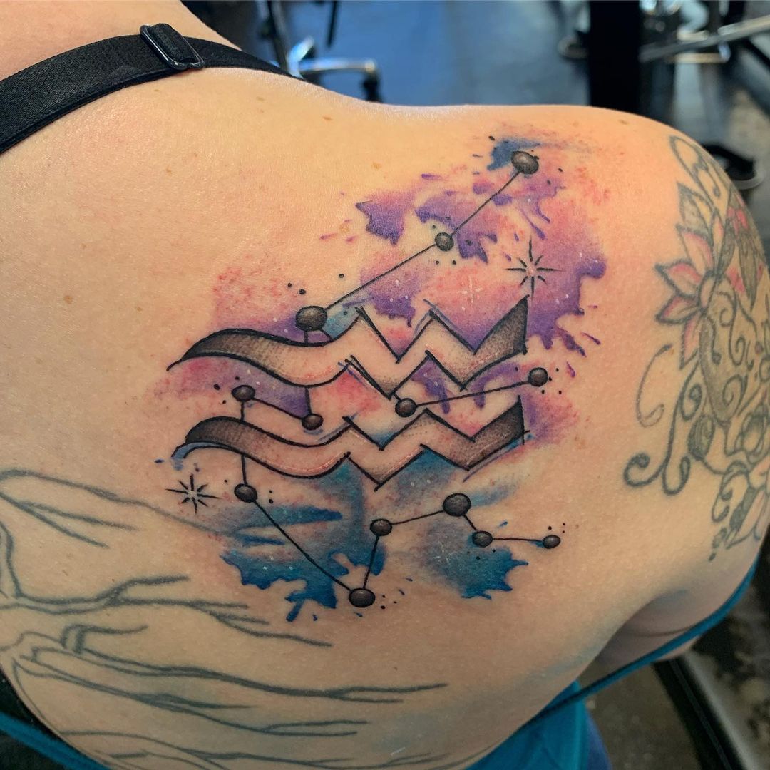 Aquarius Tattoo On Back Shoulder