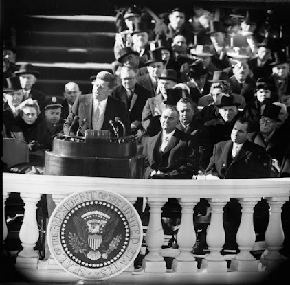 Image from https://time.com/4494515/jfk-inaugural-address-joe-lieberman/ A portion of this speech is recited here by a congressional leader