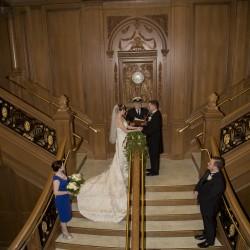 A bride and groom on stairs

Description automatically generated with medium confidence