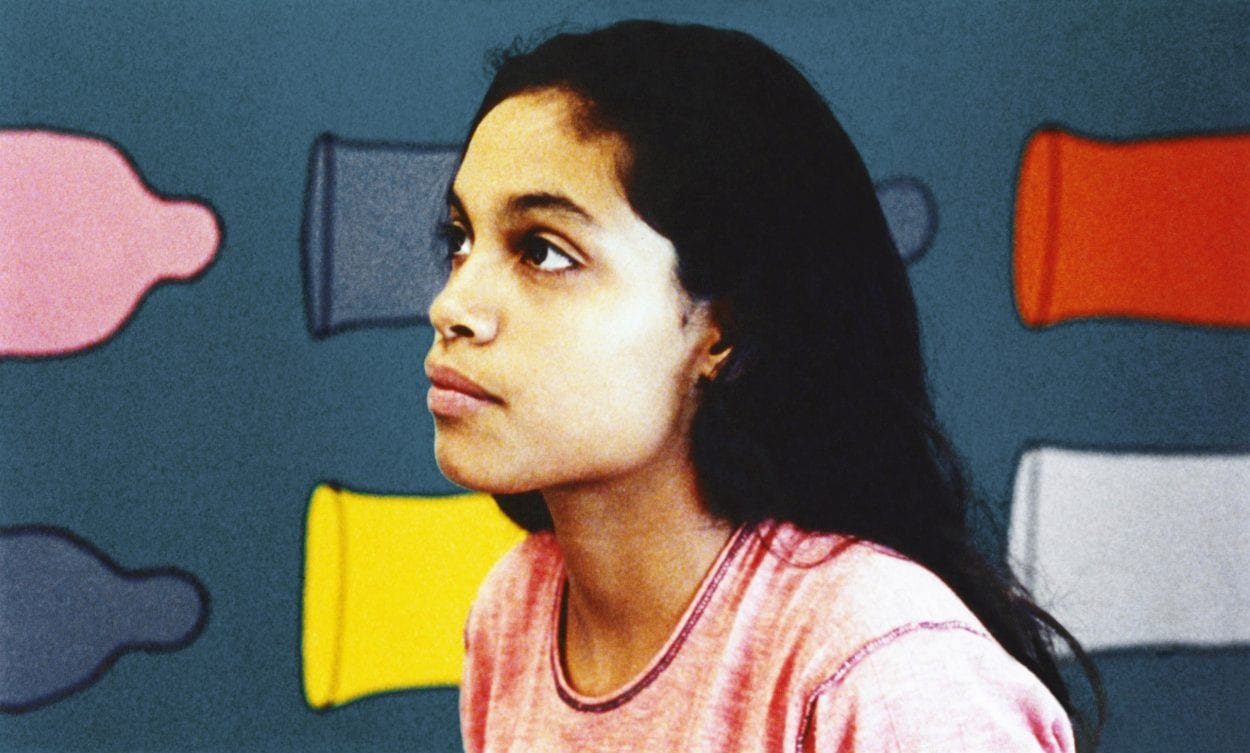 Ruby played by Rosario Dawson at a testing clinic