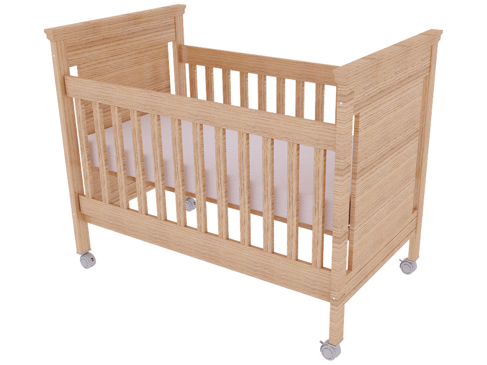Move a baby from a cot bed to a toddler bed at the age of 2 or when they are 35 inches tall.