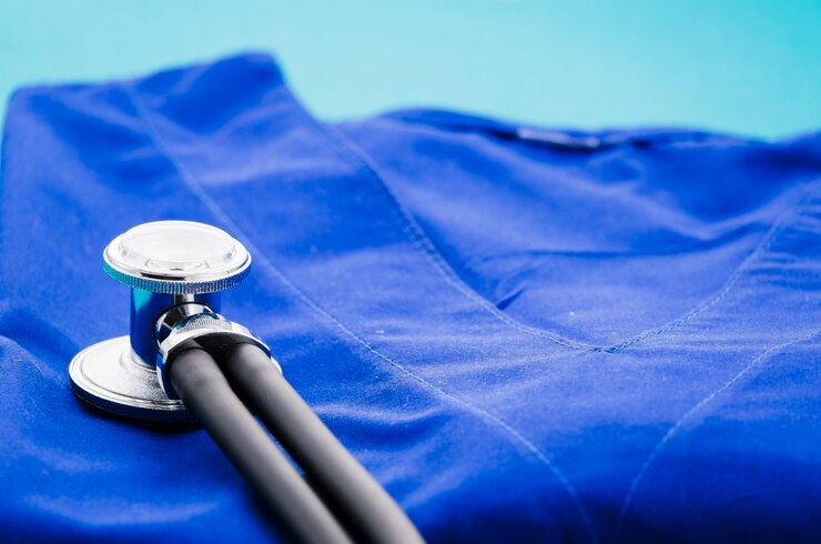 Stethoscope on a blue background, medical equipment.