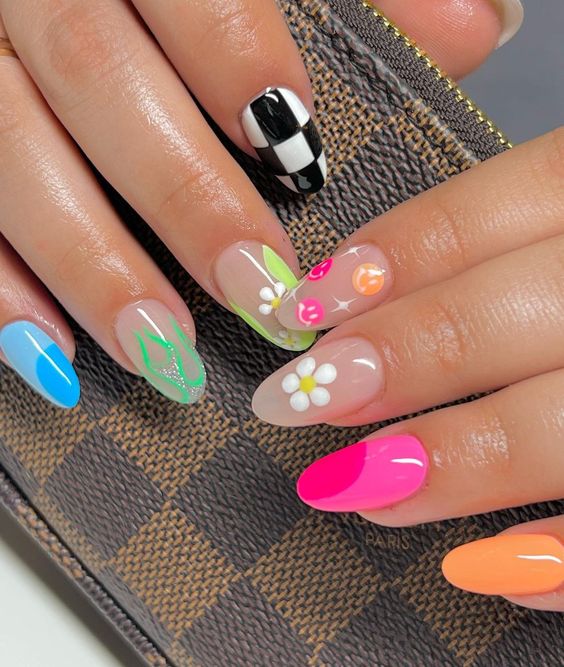 Mix and match summer nail idea with checkboard, flower, and solid colors