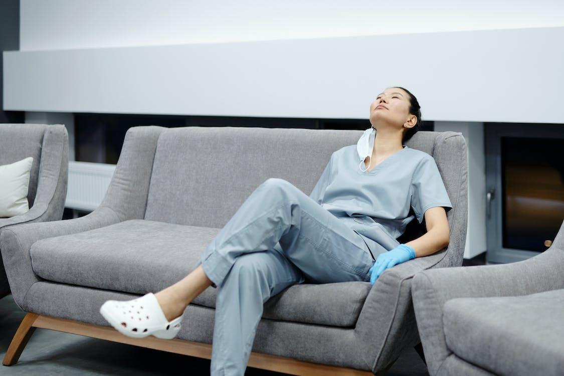Free Photo Of Woman Resting On The Couch  Stock Photo