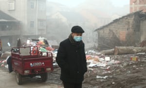 A man wearing a medical mask walks in Hubei province amid the coronavirus lockdown