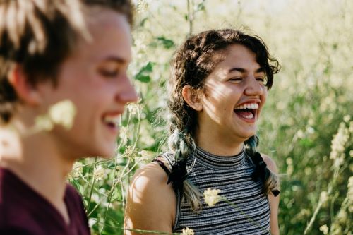 Young people look happy after they discover the best Minnesota credit union. 