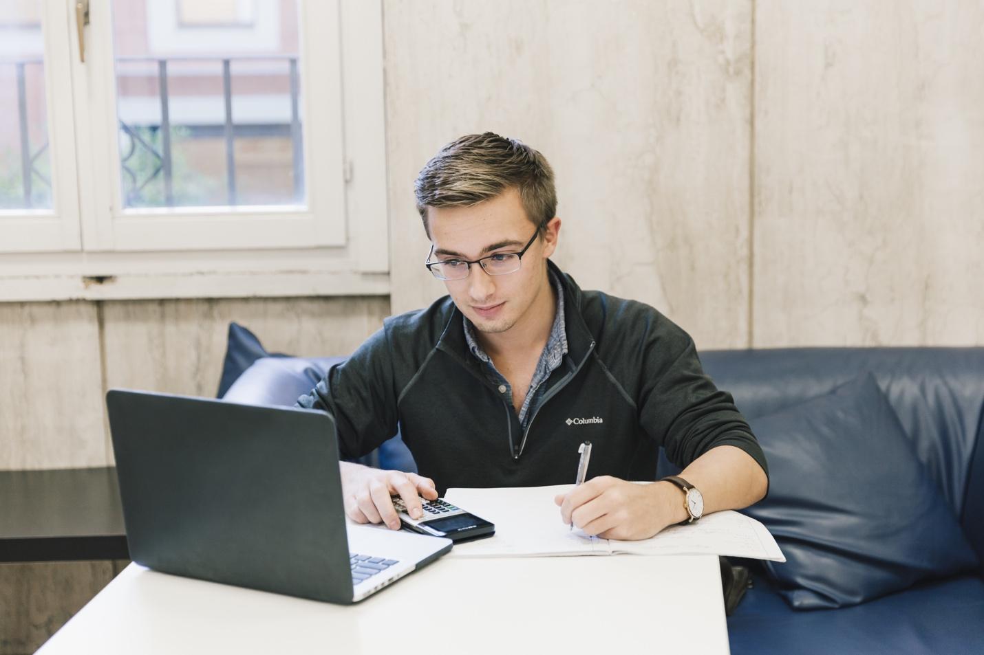 Student studying on laptop